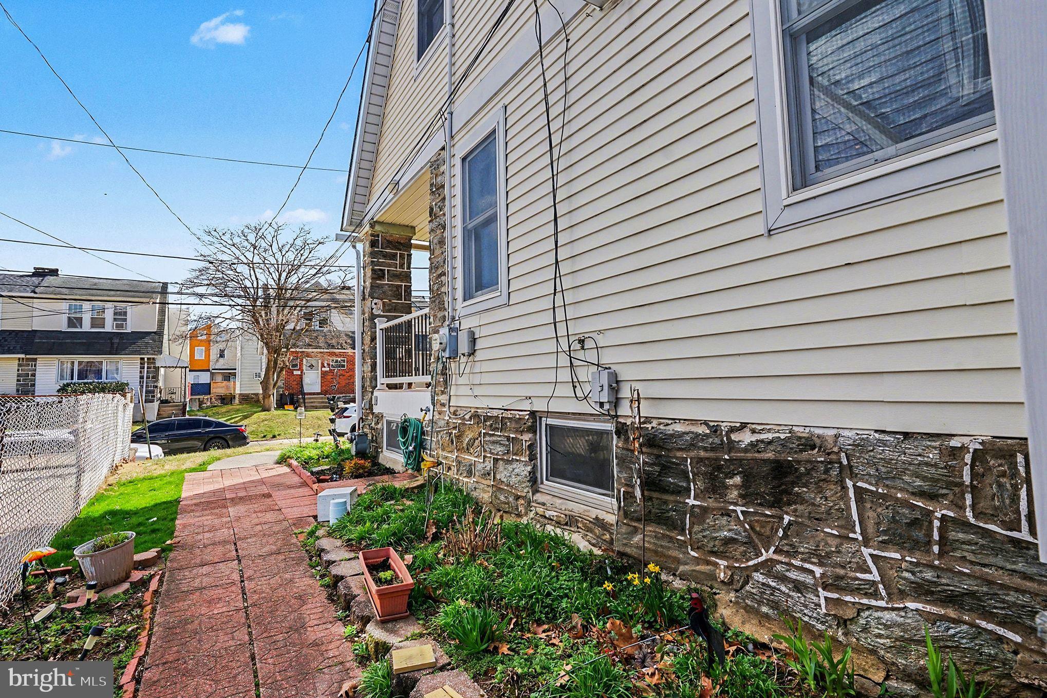 4031 Vernon Road Drexel Hill, PA 19026 - Photo 34 of 38 a backyard of a house with seating space
