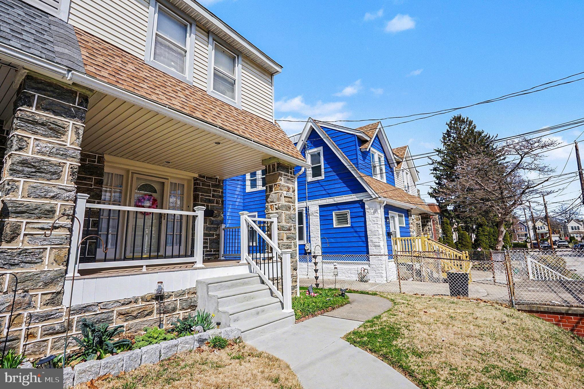 4031 Vernon Road Drexel Hill, PA 19026 - Photo 4 of 38 a front view of a house with a porch