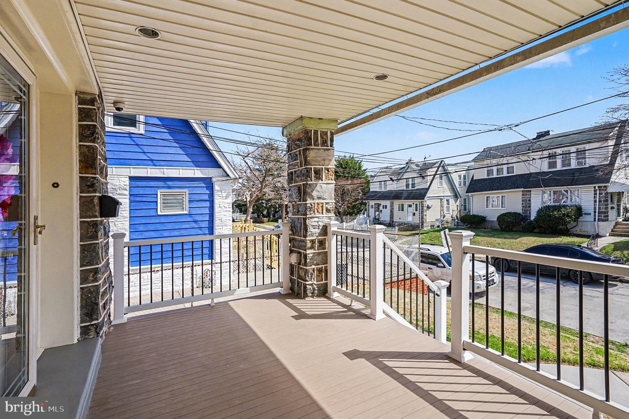 4031 Vernon Road Drexel Hill, PA 19026 - Photo 5 of 38 a view of a house with a balcony