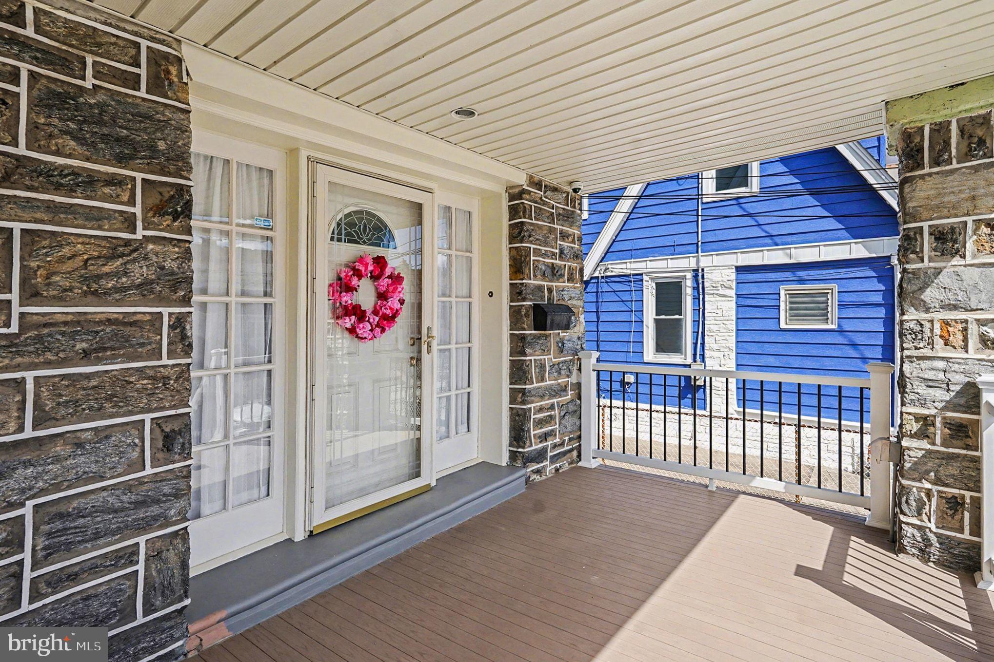 4031 Vernon Road Drexel Hill, PA 19026 - Photo 6 of 38 a view of a brick house with a large window