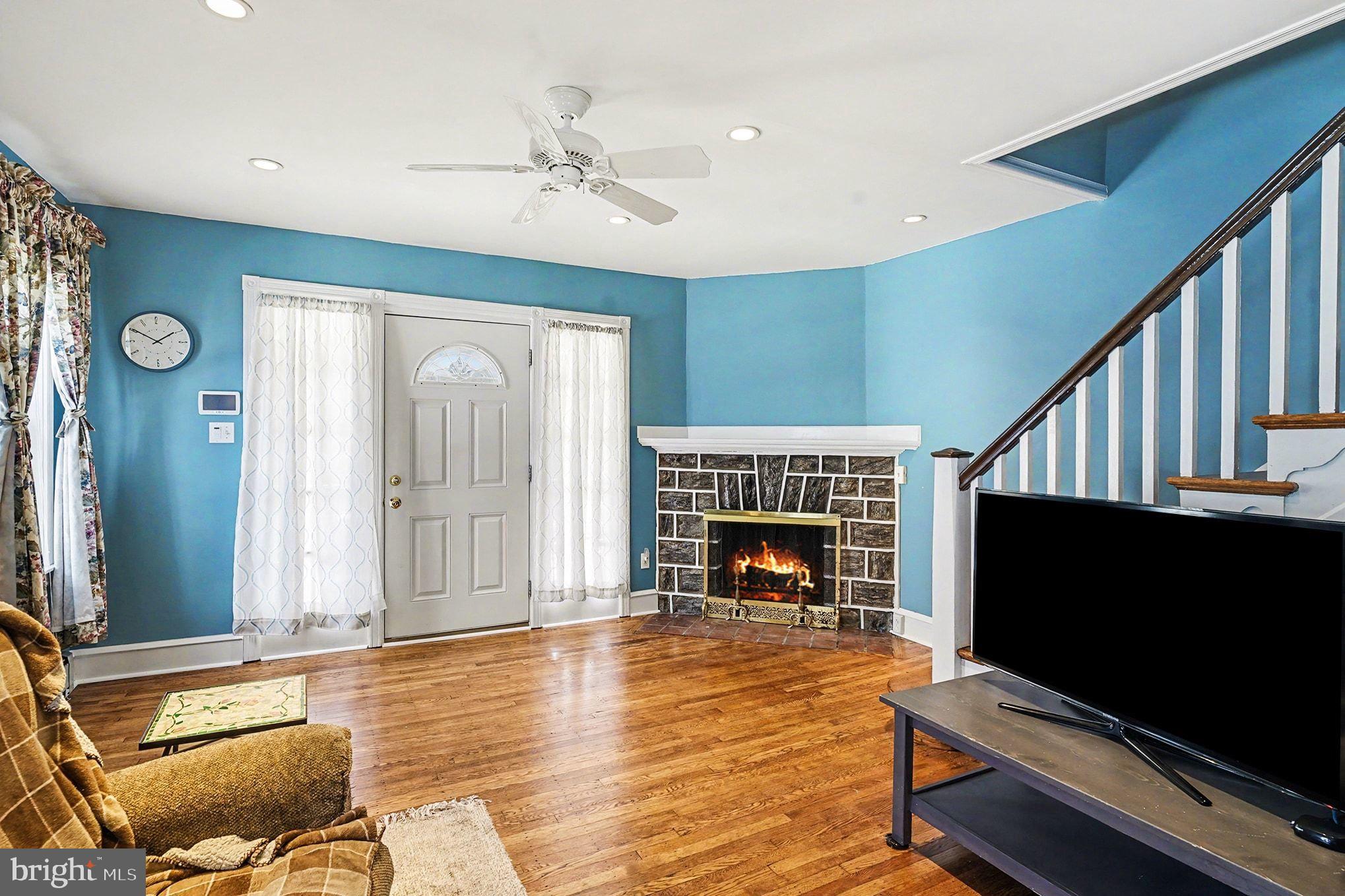 4031 Vernon Road Drexel Hill, PA 19026 - Photo 7 of 38 a living room with furniture and a flat screen tv