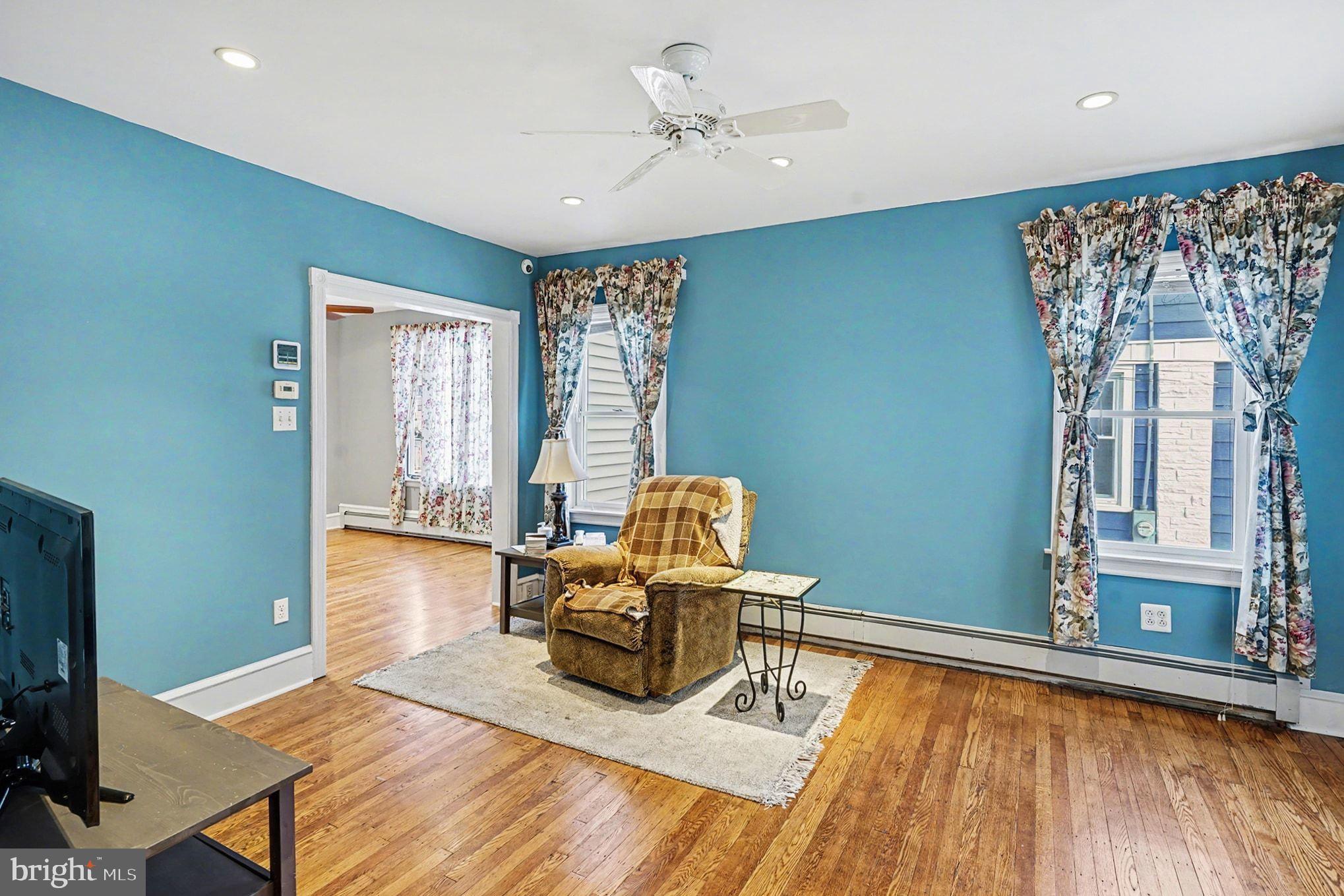 4031 Vernon Road Drexel Hill, PA 19026 - Photo 10 of 38 a living room with furniture and a large window