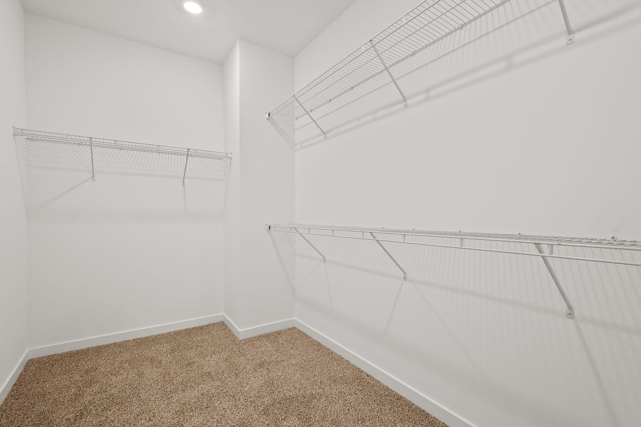 10657 Blaine Street Crown Point, IN 46307 - Photo 14 of 24 a view of a room with racks on the wall