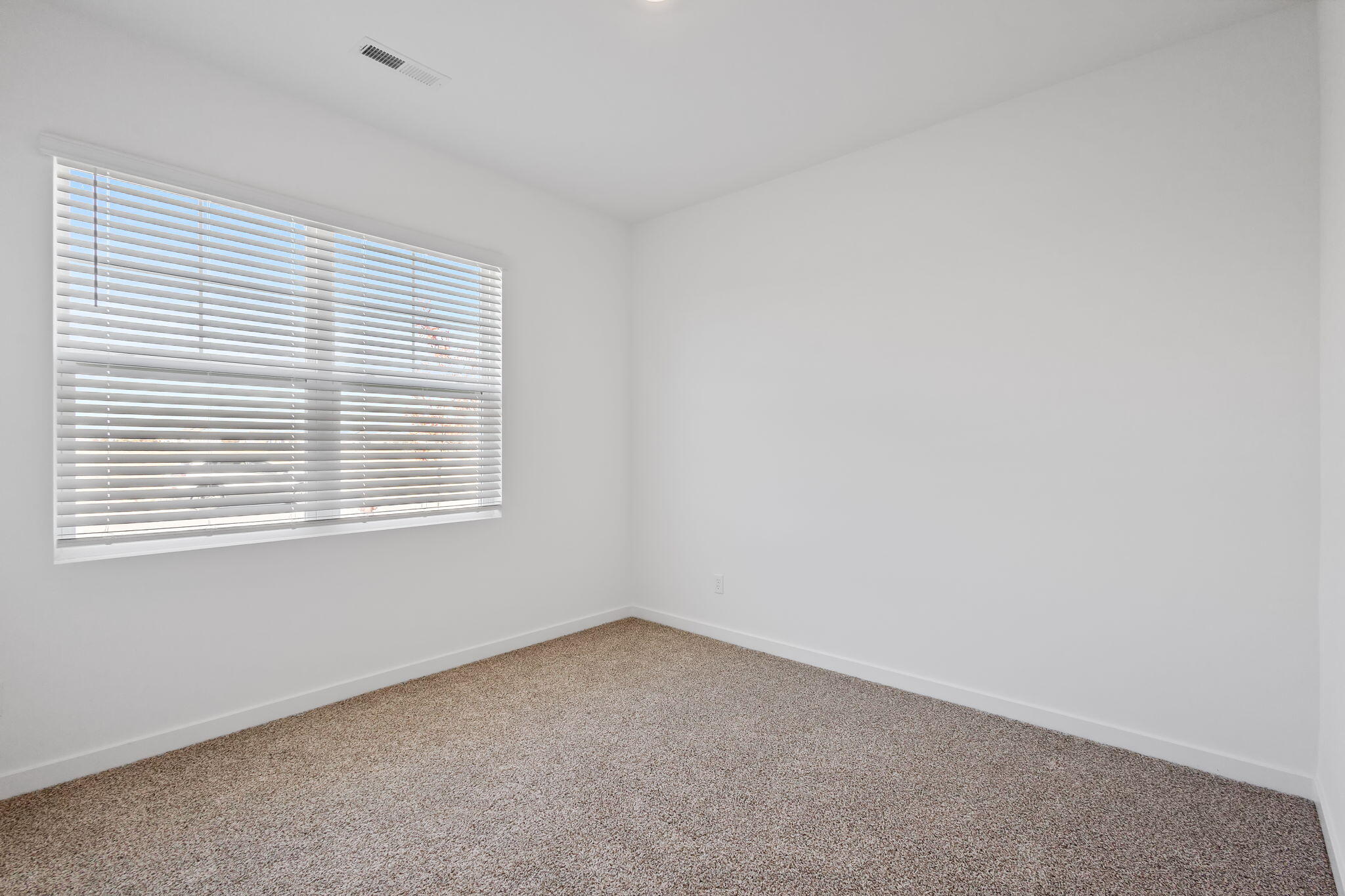 10657 Blaine Street Crown Point, IN 46307 - Photo 17 of 24 an empty room with a window