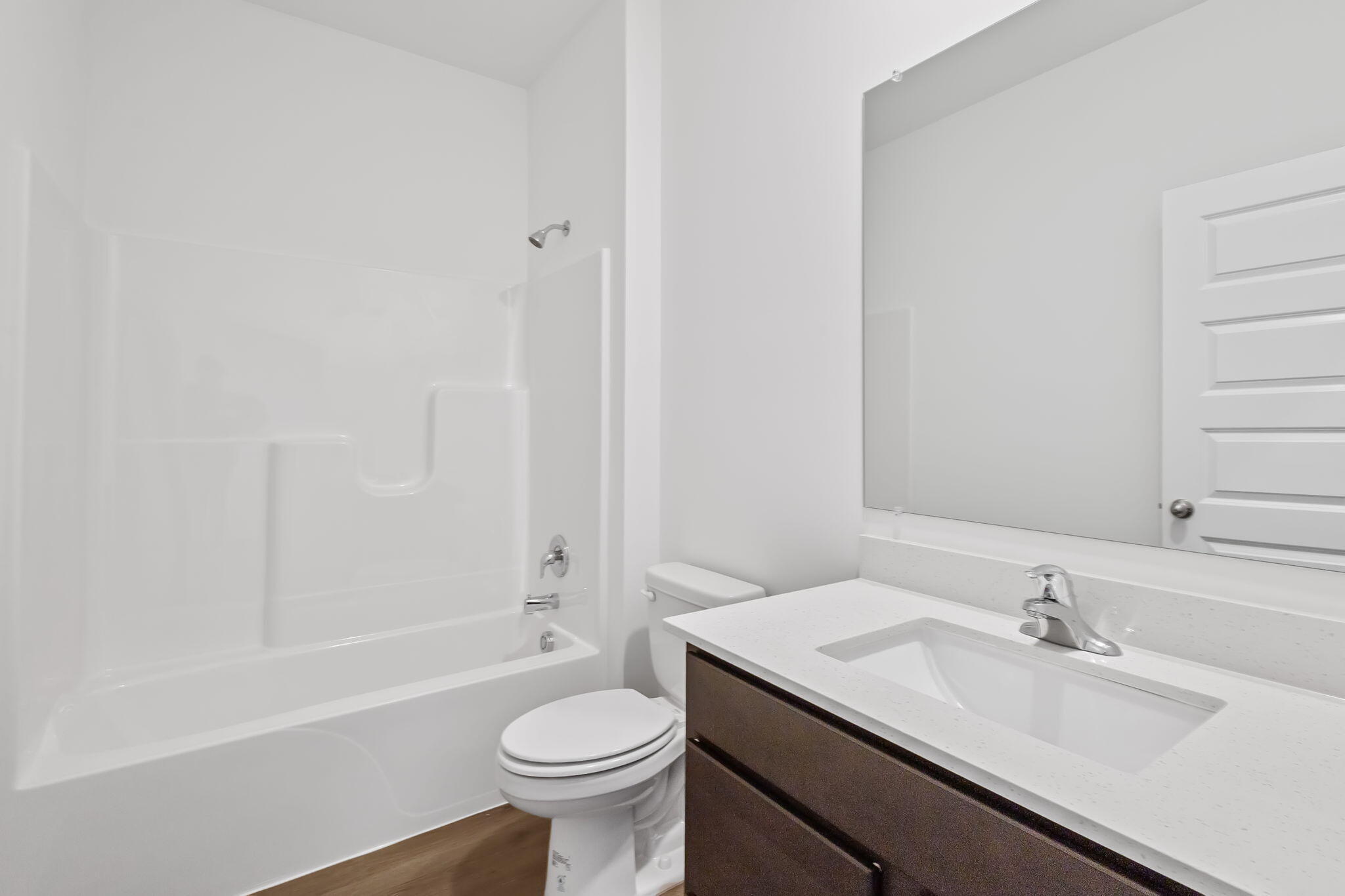 10657 Blaine Street Crown Point, IN 46307 - Photo 19 of 24 a bathroom with a sink and a mirror