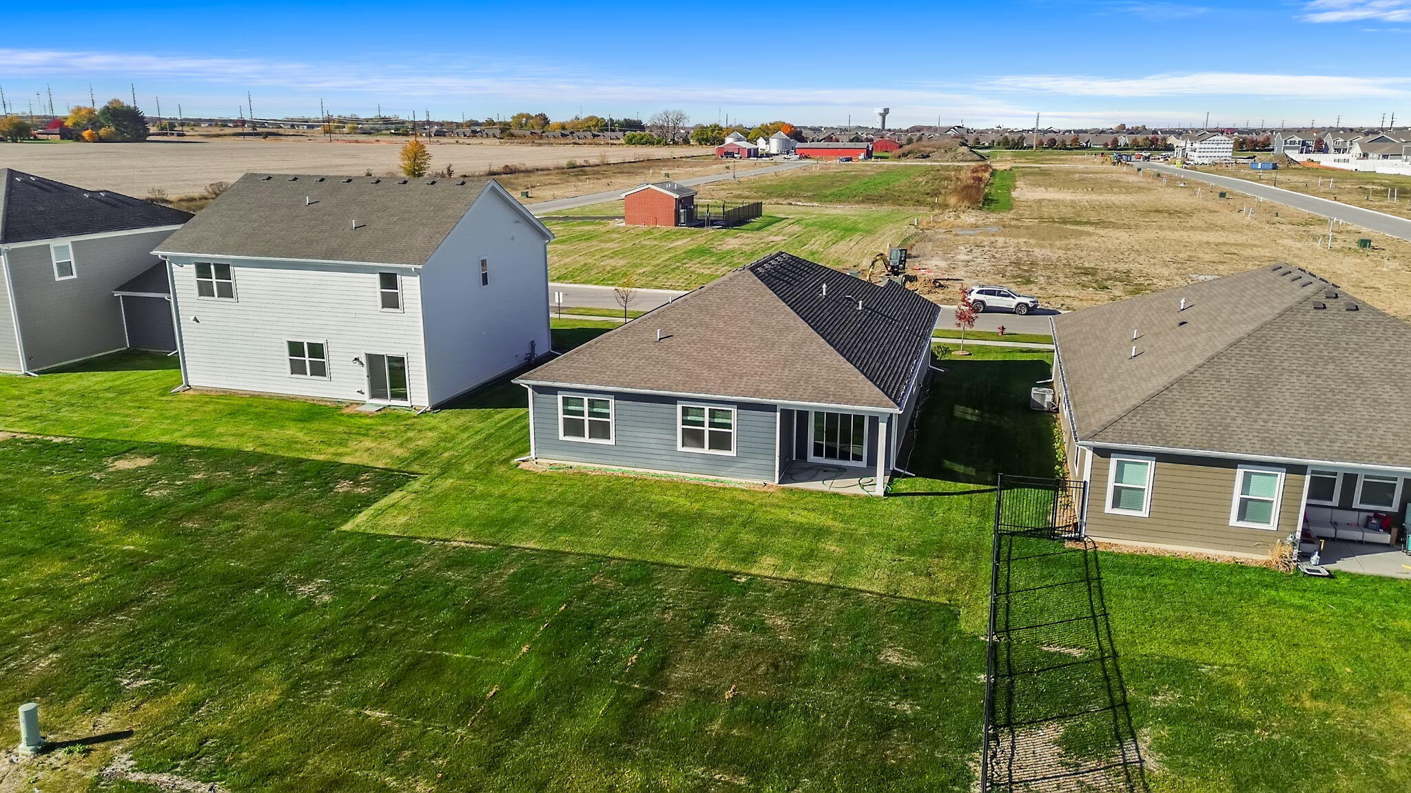 10657 Blaine Street Crown Point, IN 46307 - Photo 23 of 24 an aerial view of a house with a yard and lake view