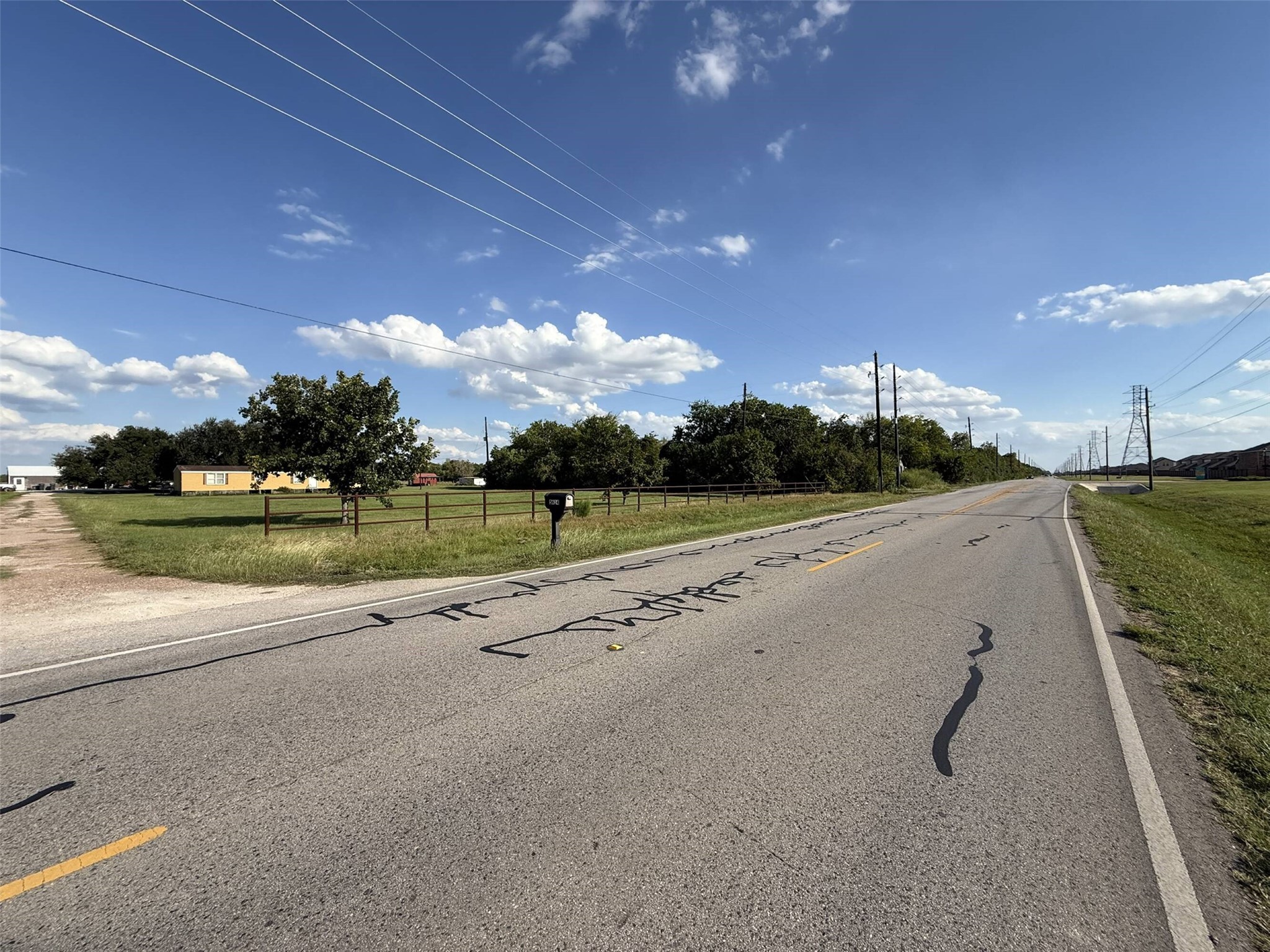 5614 Pitts Road Katy, TX 77493 - Photo 12 of 14 a view of a street with a yard