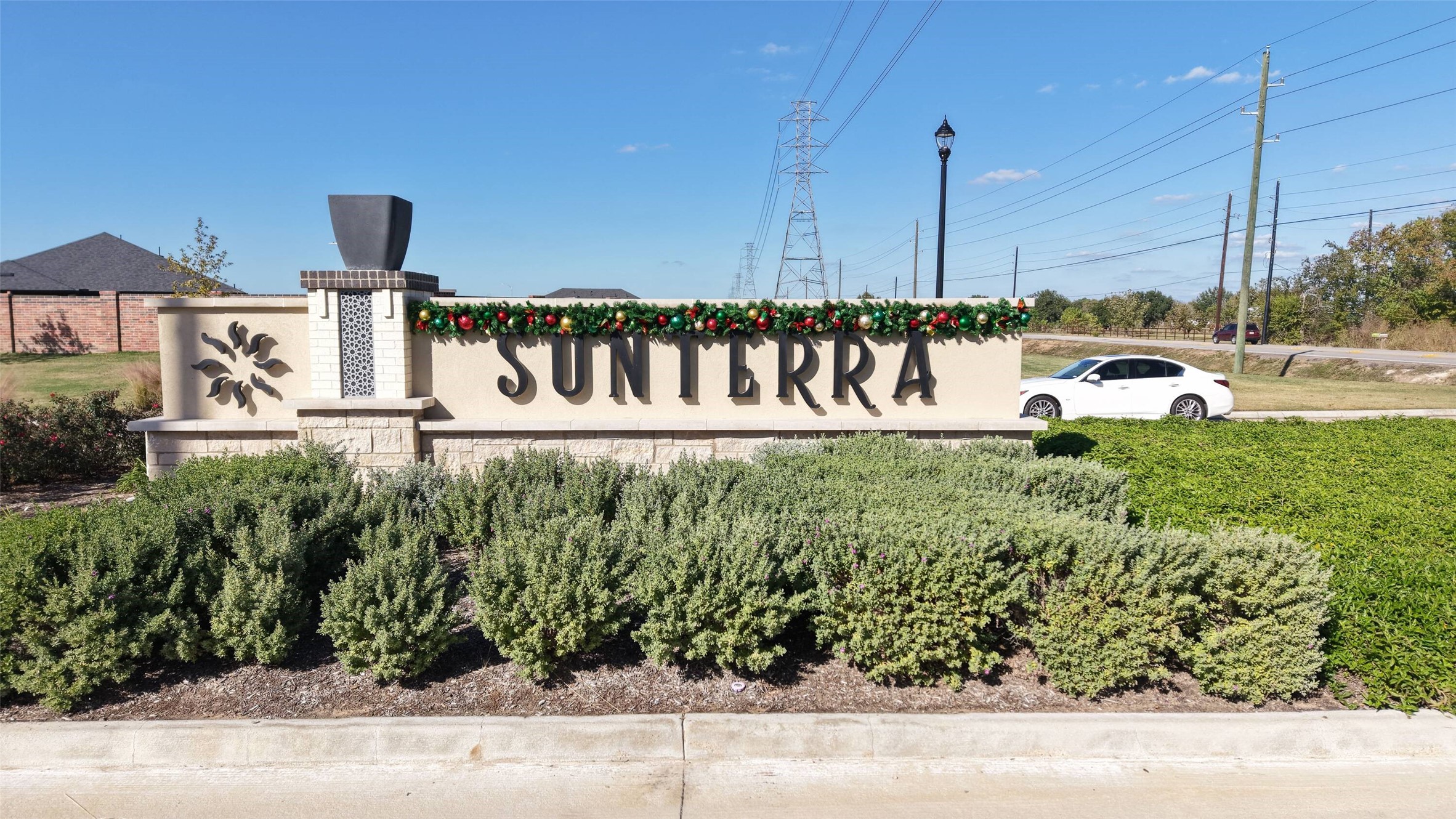 5614 Pitts Road Katy, TX 77493 - Photo 13 of 14 a view of a yard with potted plants