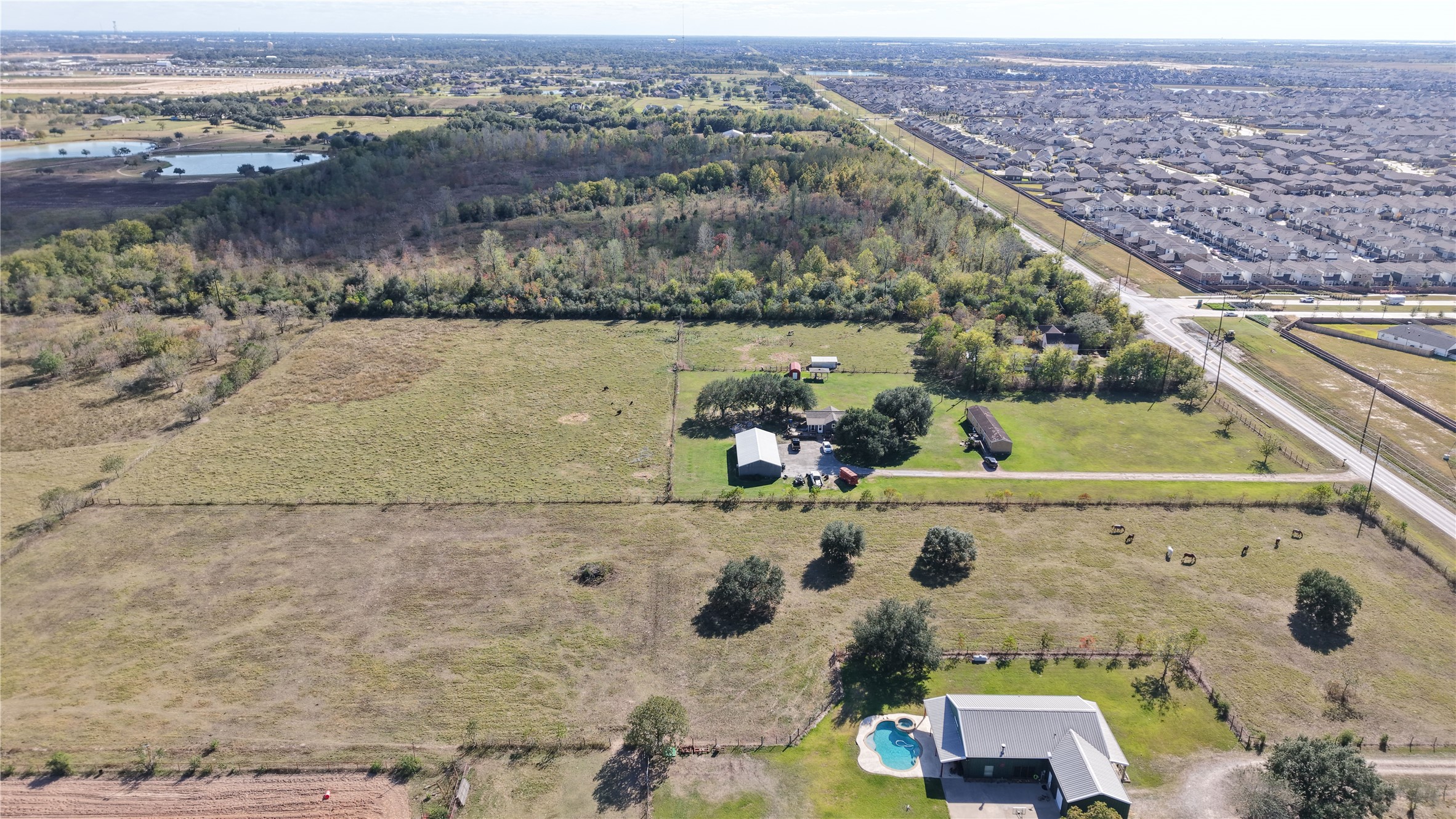 5614 Pitts Road Katy, TX 77493 - Photo 20 of 29 an aerial view of a house with a lake view