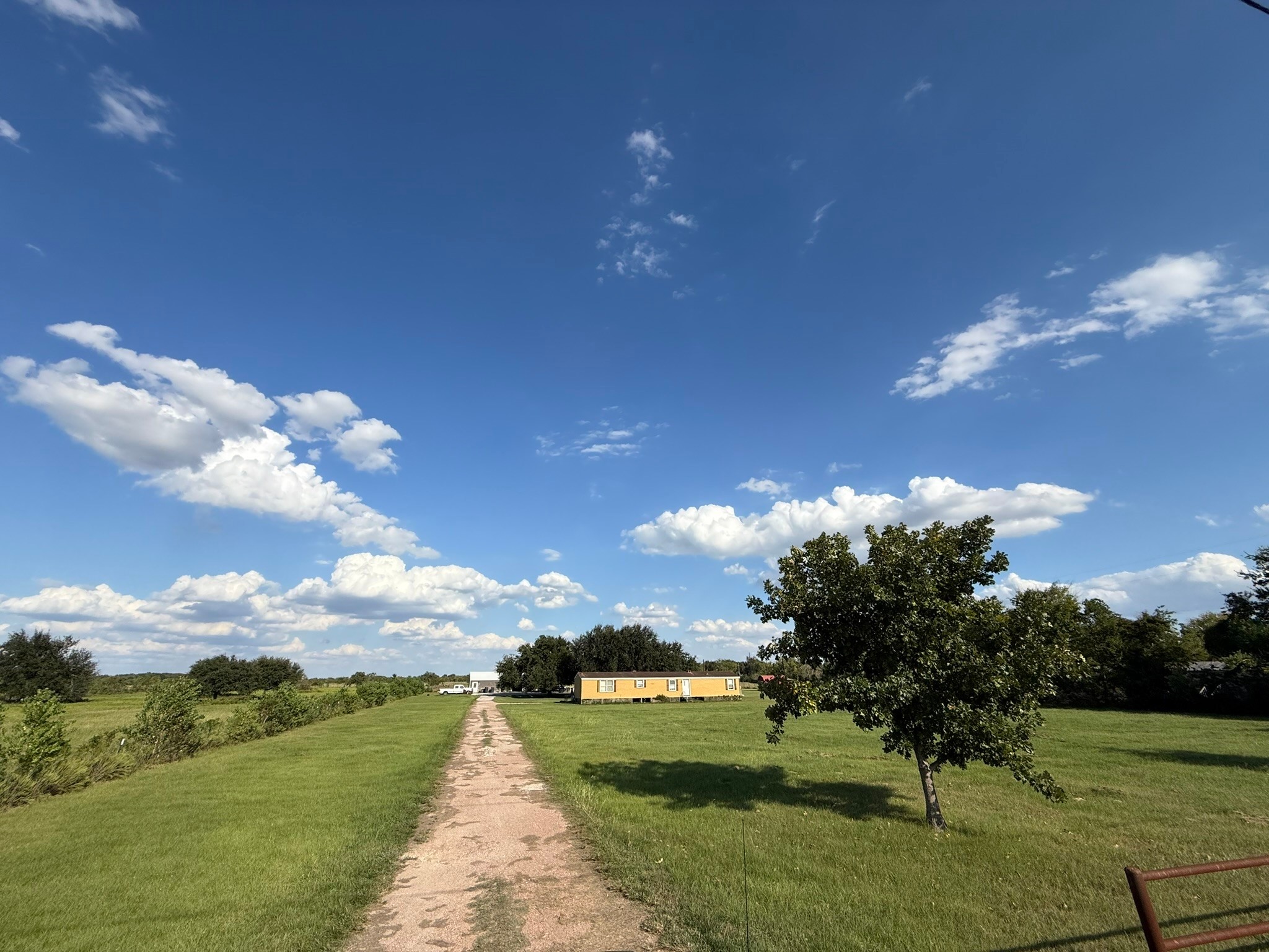 5614 Pitts Road Katy, TX 77493 - Photo 7 of 29 a view of a pathway with a yard