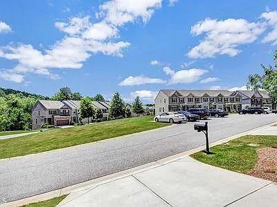 4645 Cold Spring Court Cumming, GA 30041 - Photo 23 of 23 a city view with houses and a yard