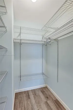 a view of a room with racks on the wall