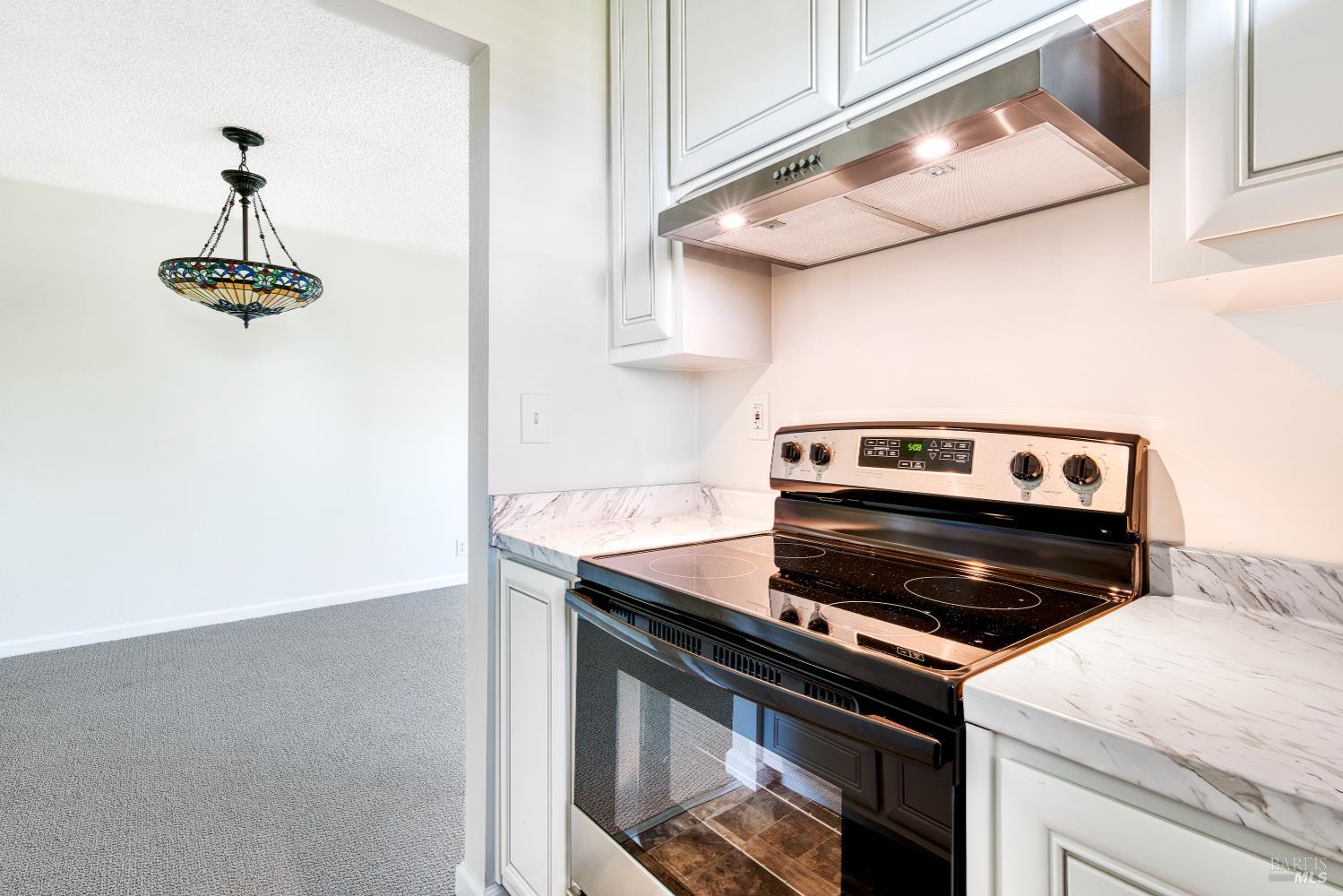 247 Bahia Place San Rafael, CA 94901 - Photo 12 of 22 a close view of stove and microwave