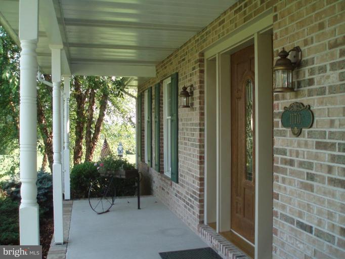 1170 Taylor Road Street, MD 21154 - Photo 17 of 30 Enjoy your acreage and quiet times on your porch