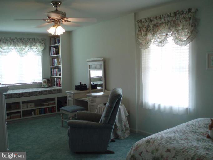 1170 Taylor Road Street, MD 21154 - Photo 20 of 30 Bedroom 2 w/built in shelving and huge sit area