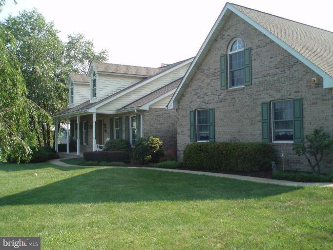 1170 Taylor Road Street, MD 21154 - Photo 5 of 30 Brick front w/flowing sidewalk to entrance