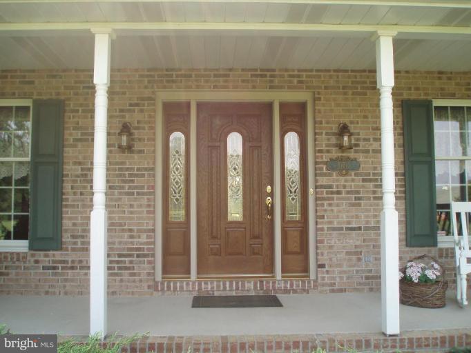 1170 Taylor Road Street, MD 21154 - Photo 6 of 30 Welcoming entrance and relaxing front porch