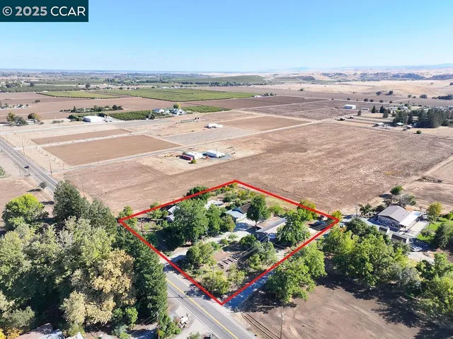 an aerial view of beach and ocean