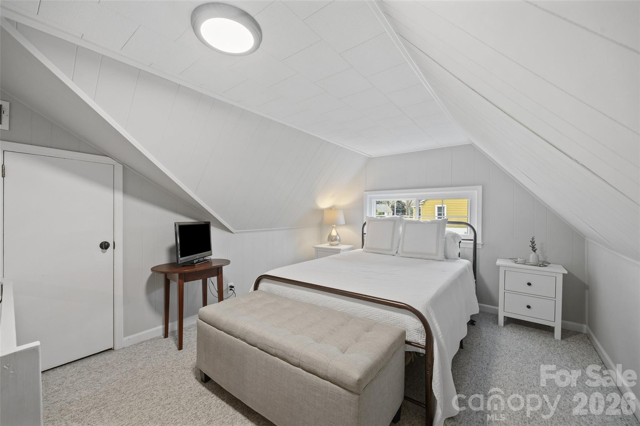 411 Williamson Street Fort Mill, SC 29715 - Photo 23 of 40 a bedroom with a bed and a chair in it