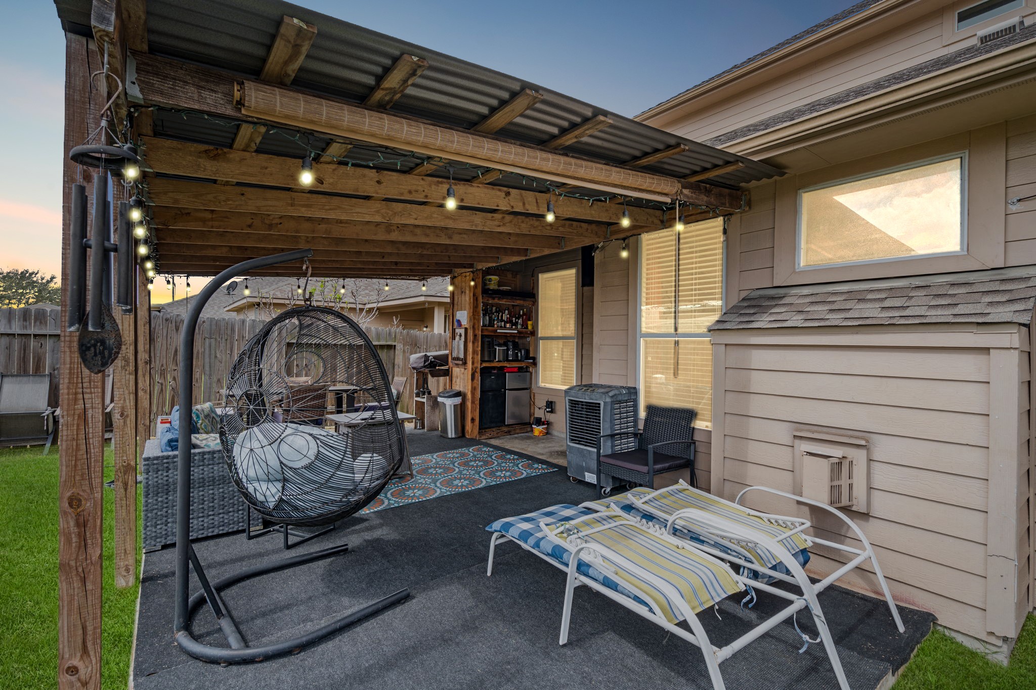 1319 Collier Point Lane Fresno, TX 77545 - Photo 27 of 33 The covered patio creates an inviting outdoor retreat, perfect for relaxing with a book, enjoying morning coffee, or hosting weekend gatherings.
