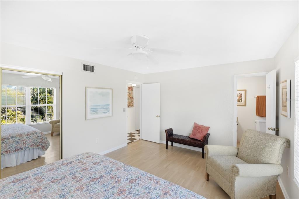 212 85th Street Holmes Beach, FL 34217 - Photo 22 of 45 a living room with furniture and a window