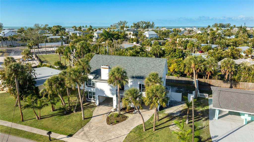 212 85th Street Holmes Beach, FL 34217 - Photo 37 of 45 a view of outdoor space and yard
