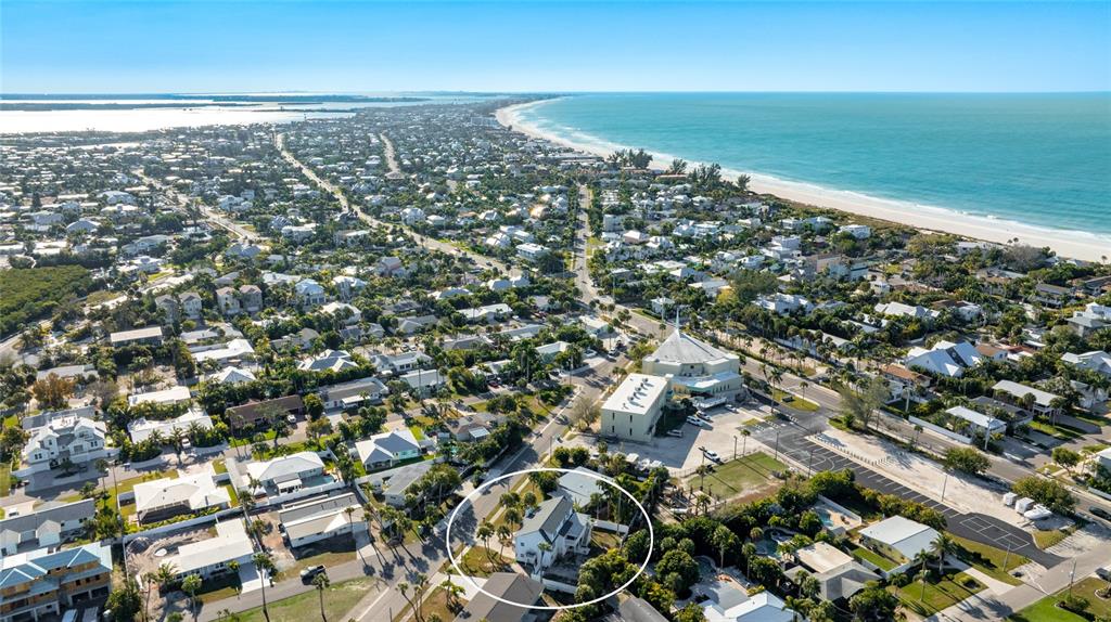 212 85th Street Holmes Beach, FL 34217 - Photo 45 of 45 an aerial view of residential building and ocean