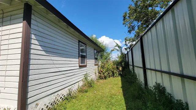 a view of a backyard with plants