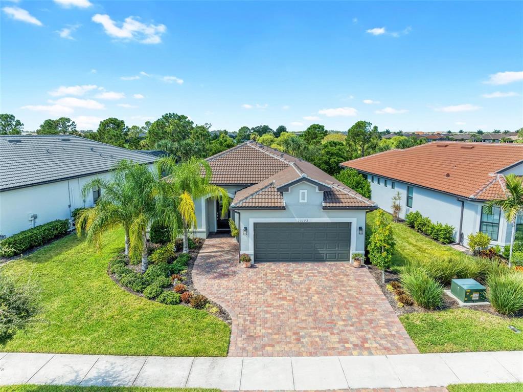 13172 Rinella Street Venice, FL 34293 - Photo 1 of 1 front view of a house with a yard