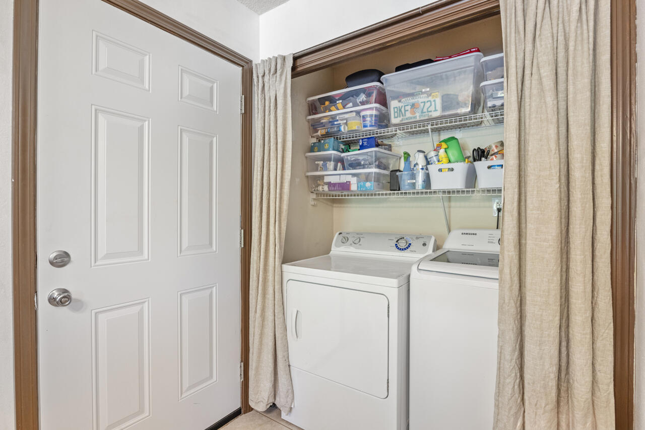 7151 Wallace Drive Pace, FL 32571 - Photo 26 of 40 a utility room with dryer and washer