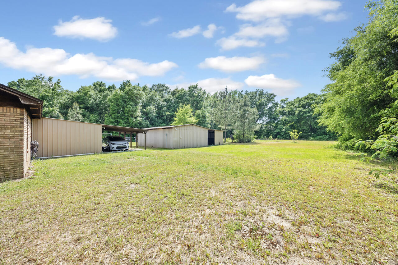7151 Wallace Drive Pace, FL 32571 - Photo 29 of 40 a view of outdoor space and yard
