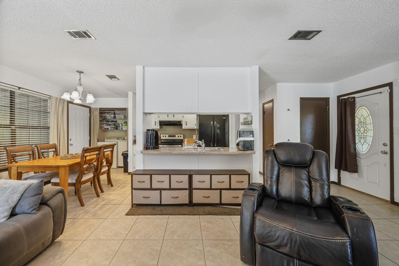 7151 Wallace Drive Pace, FL 32571 - Photo 7 of 40 a living room with furniture