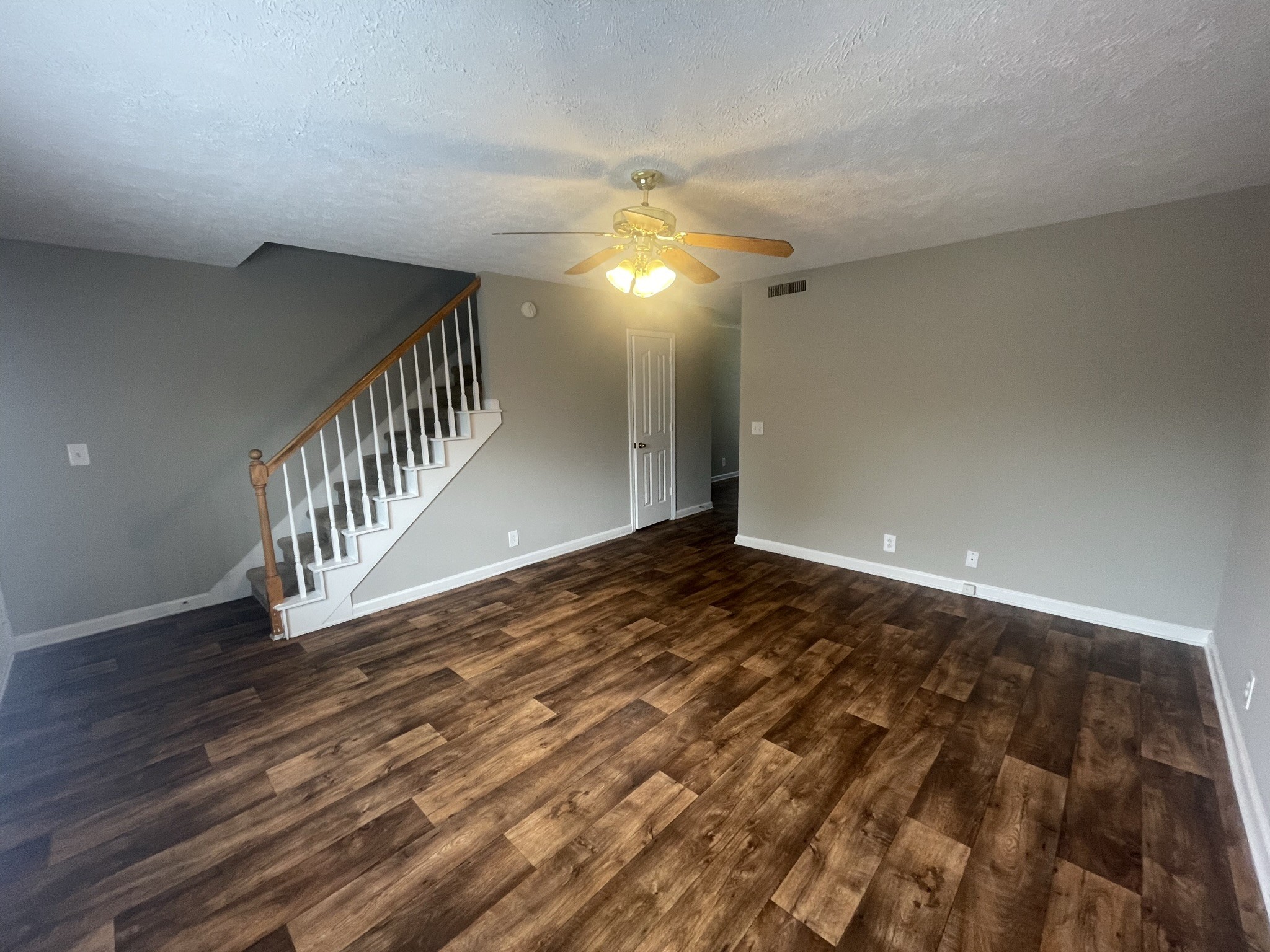 2328 Willowbrook Drive, Unit C Murfreesboro, TN 37130 - Photo 2 of 13 a view of an empty room with wooden floor