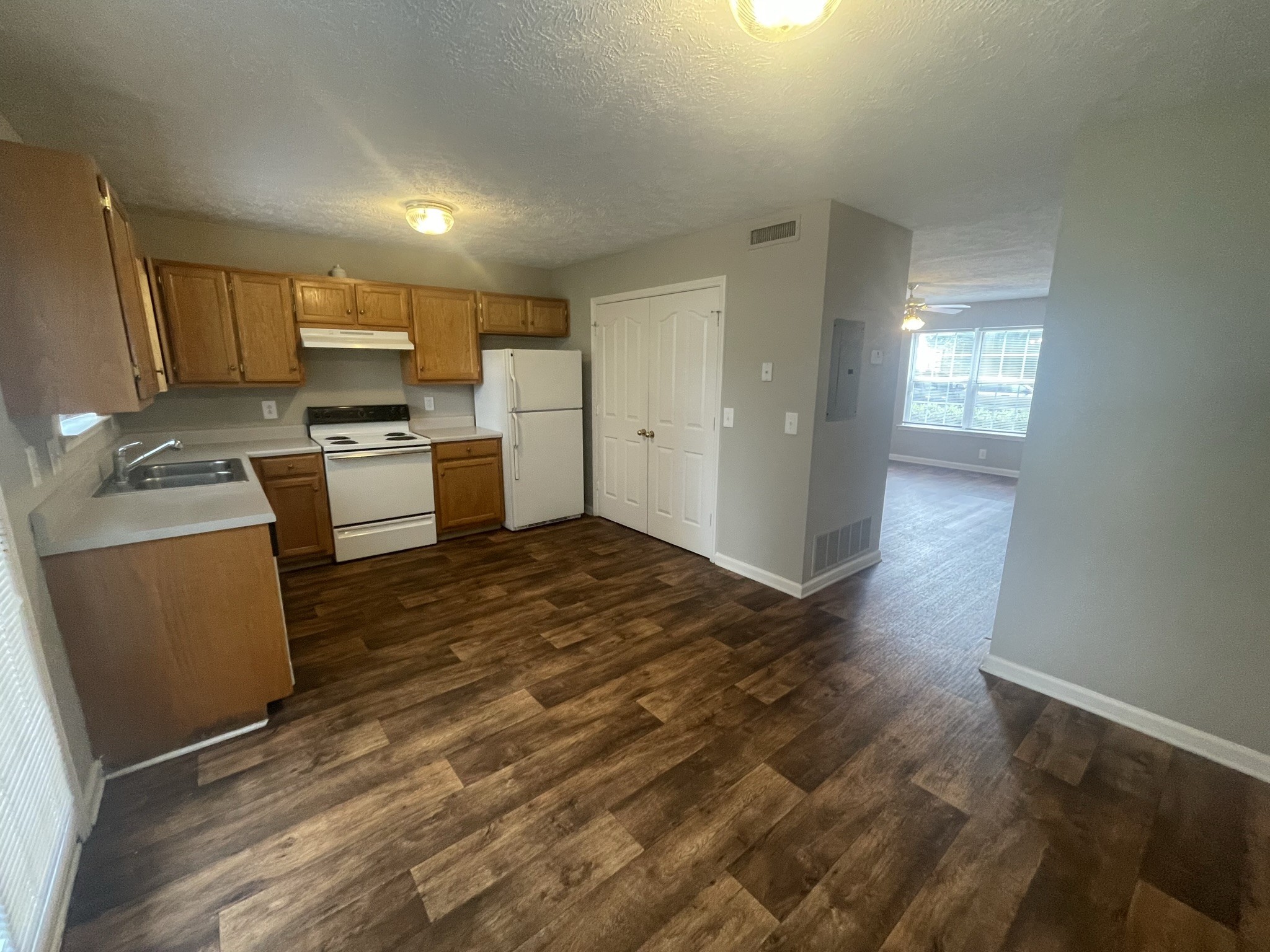 2328 Willowbrook Drive, Unit C Murfreesboro, TN 37130 - Photo 4 of 13 a kitchen with stainless steel appliances a refrigerator sink and microwave
