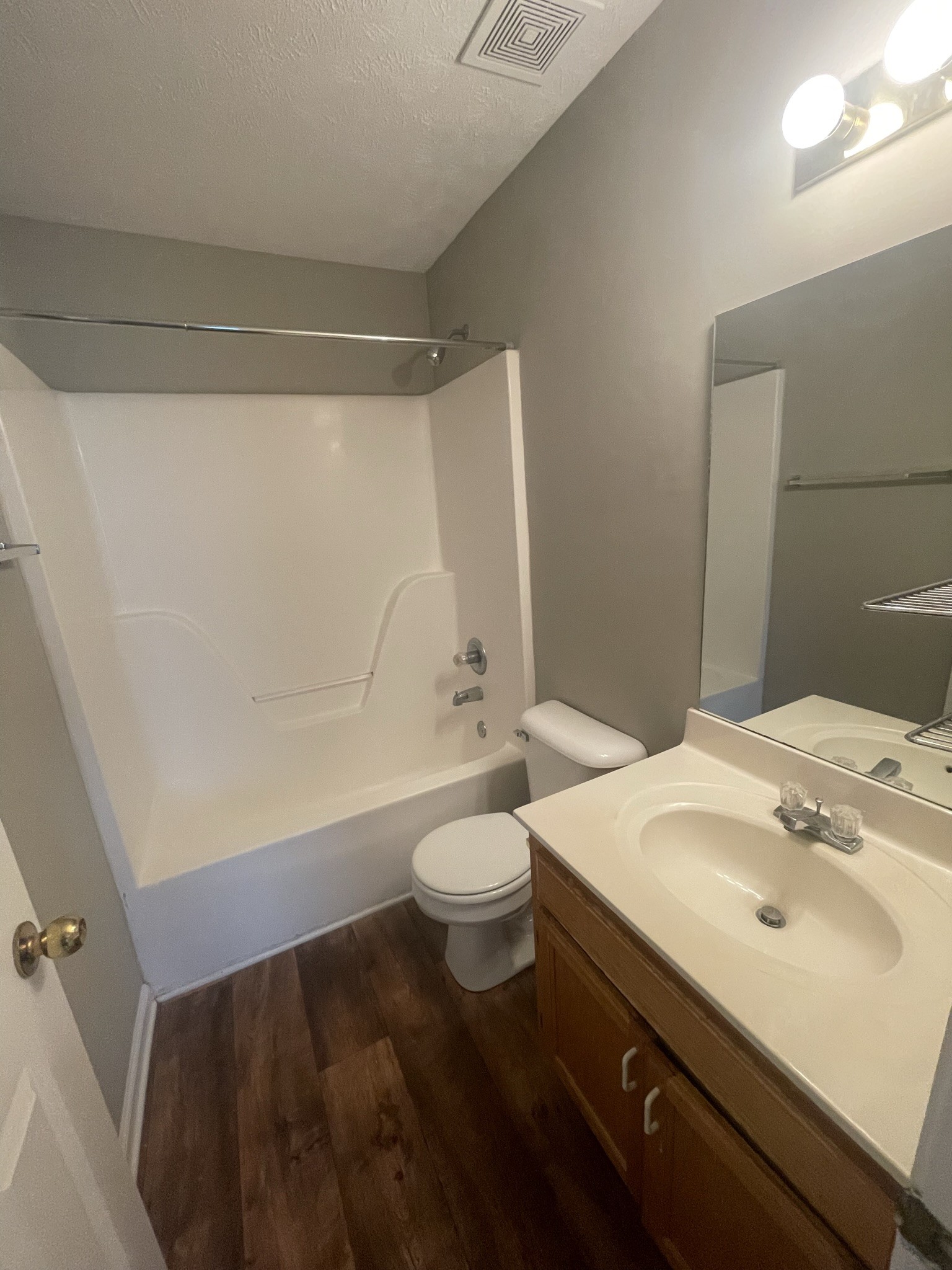 2328 Willowbrook Drive, Unit C Murfreesboro, TN 37130 - Photo 9 of 13 a bathroom with a sink a toilet and shower