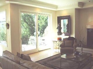 111 Reed Ranch Road Tiburon, CA 94920 - Photo 8 of 10 a living room with furniture and a large window