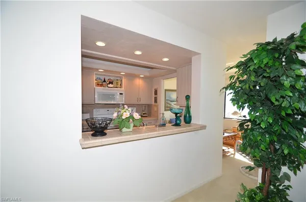 view of living room with furniture and potted plants