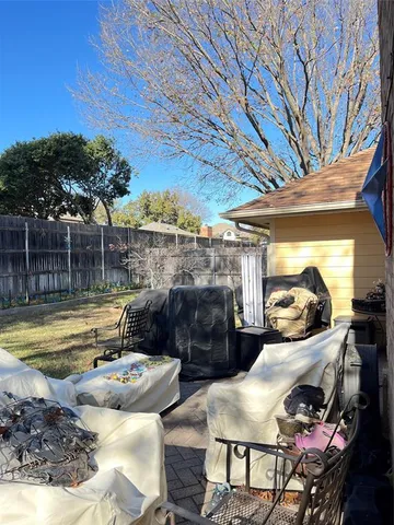 a view of swimming pool with outdoor seating