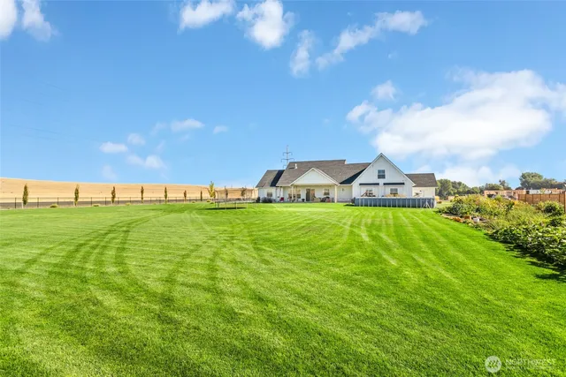 a view of swimming pool with garden