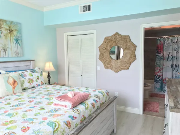 a view of front door of house with outdoor seating