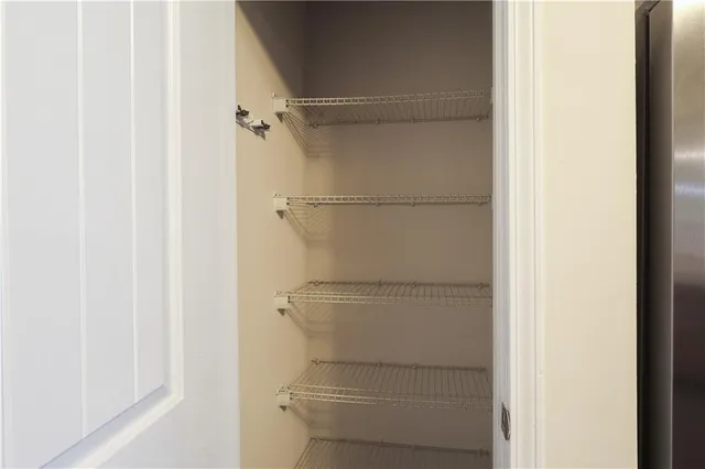 a storage room with a empty racks