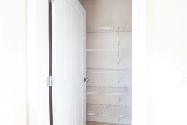 a view of small space with racks on the wall