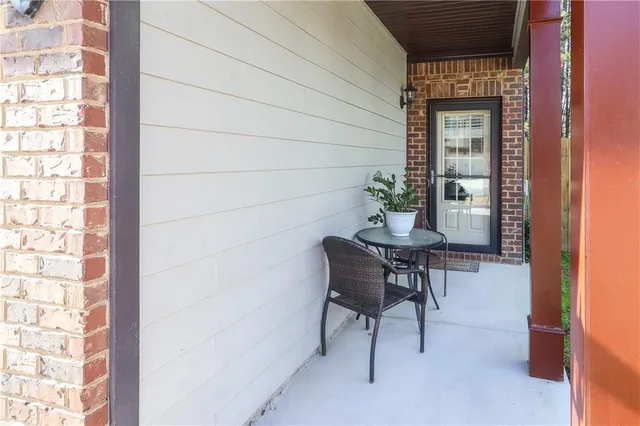 a table and chairs in a small room