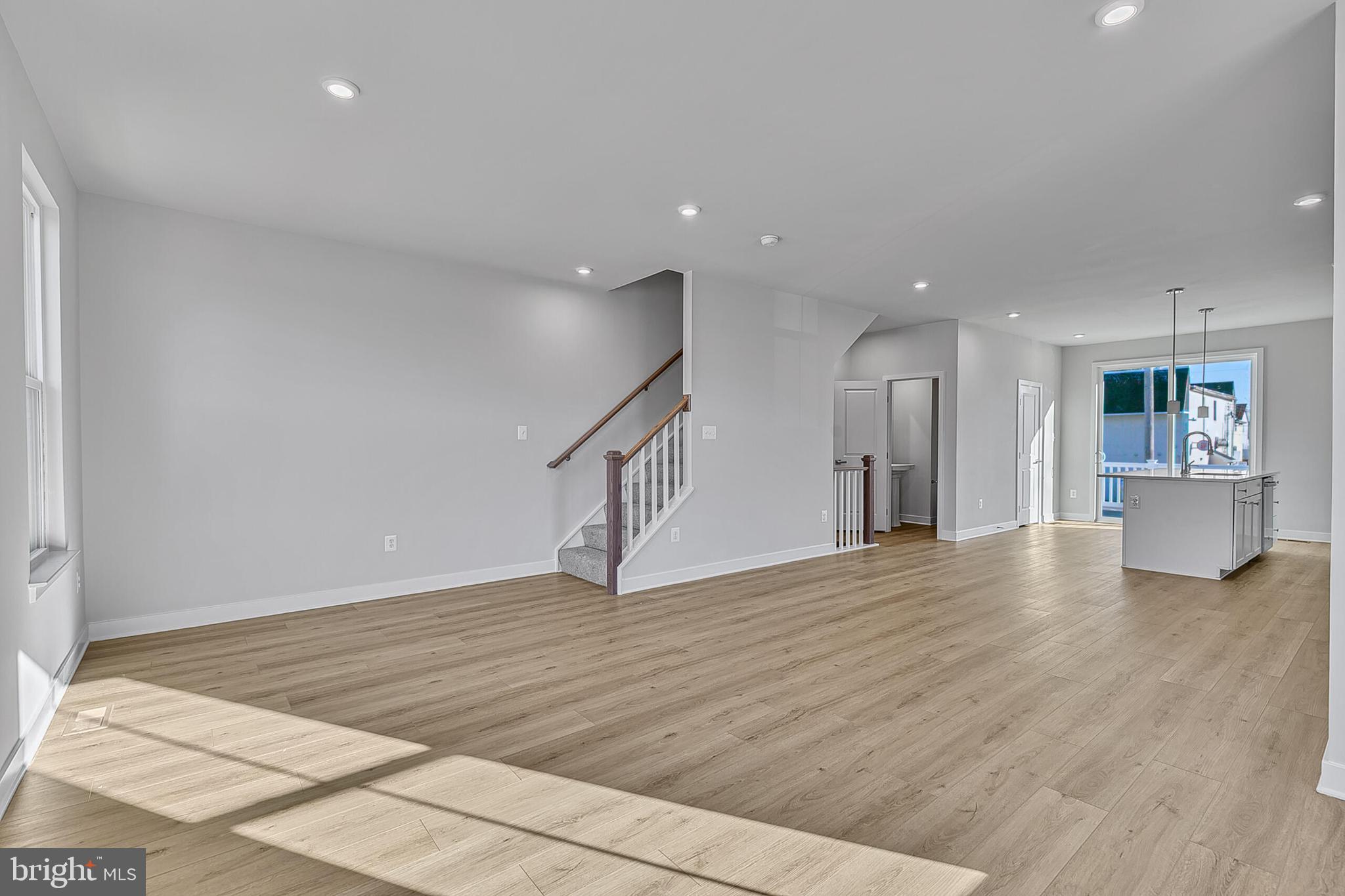 1 B Oasis Avenue Ranson, WV 25438 - Photo 25 of 39 a view of an empty room with wooden floor