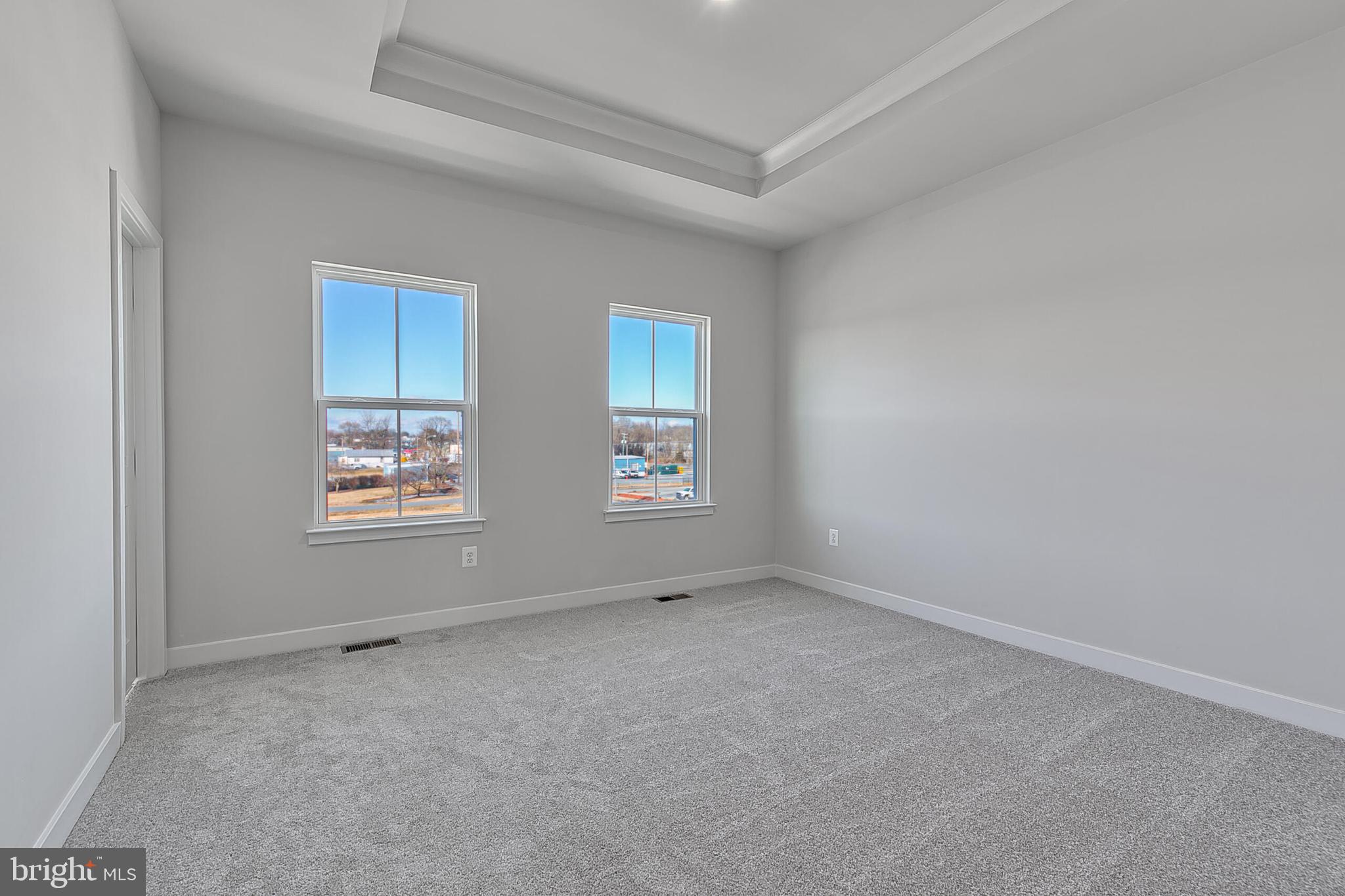 1 B Oasis Avenue Ranson, WV 25438 - Photo 33 of 39 an empty room with windows