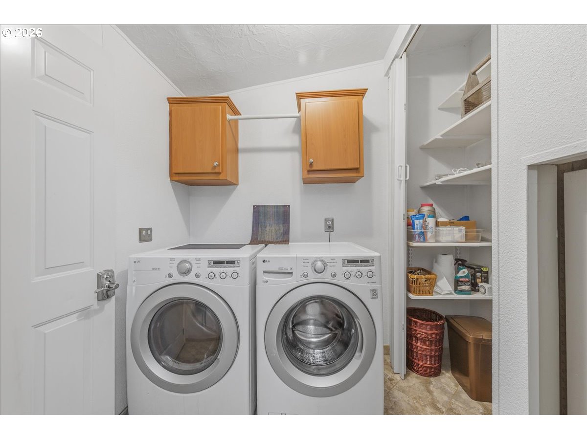 475 East 9th Street Rainier, OR 97048 - Photo 22 of 43 a utility room with sink dryer and washer