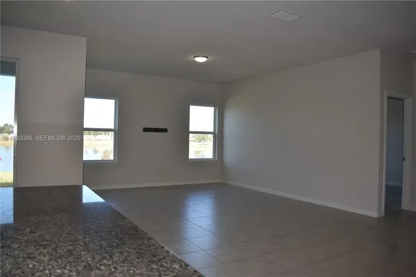 an empty room with windows