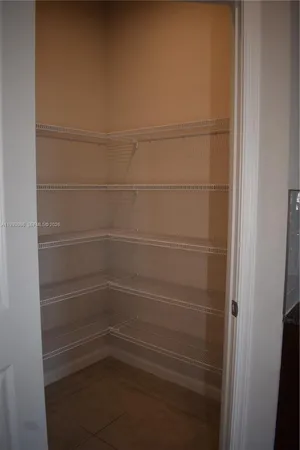 a empty closet with white paint