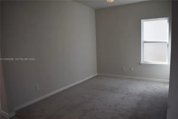a bathroom with a glass door