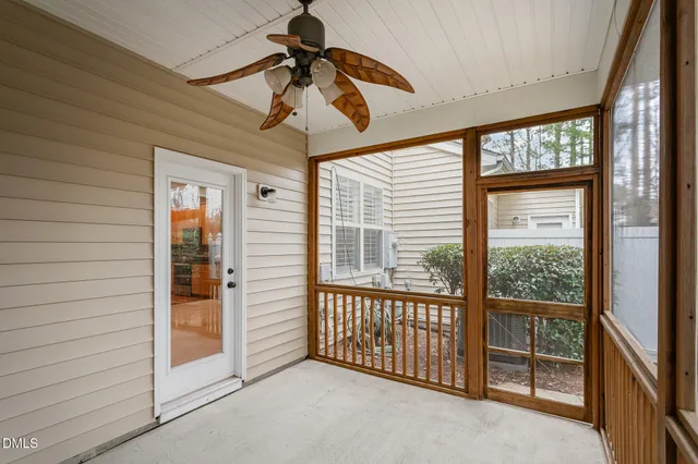 a view of a balcony with a ceiling fan